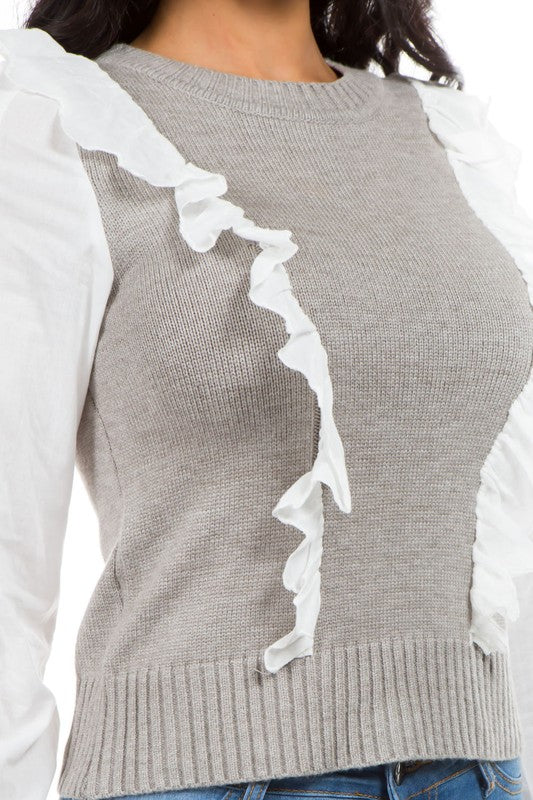 Sweater gris con vuelitos