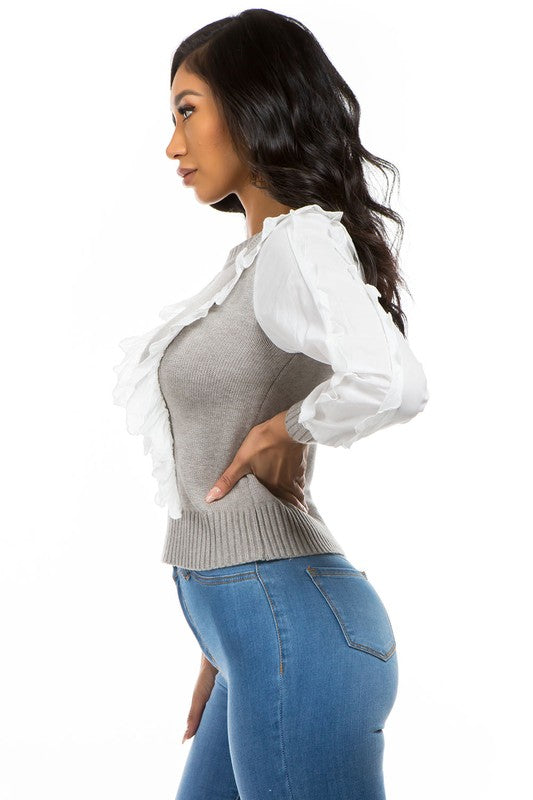 Sweater gris con vuelitos