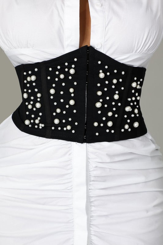 Corset negro de perlas